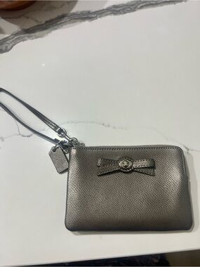 Coach Metallic Silver Bow Wristlet
